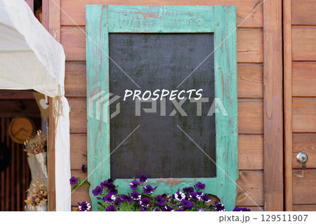 Plans and strategies for marketing marketing personalization concept. PROSPECTS word written on Charming wooden wall with a turquoise-framed chalkboard Plans and strategies for marketing marketing personalization concept. PROSPECTS word written on Charming wooden wall with a turquoise-framed chalkboard 129511907