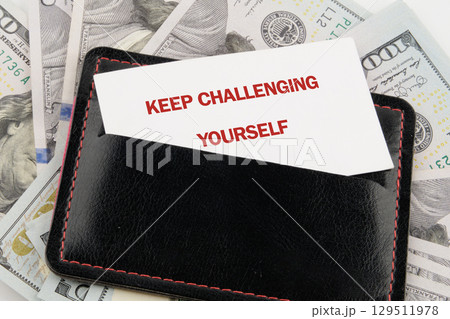 Personal growth concept. Words KEEP CHALLENGING YOURSELF Personal growth concept. Words KEEP CHALLENGING YOURSELF 129511978