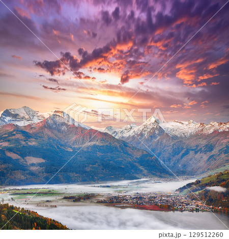 Amazing  autumn view of lake meadows trees and mountains in Sell Am See 129512260