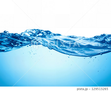 A dynamic shot of a clear blue water wave 129513265