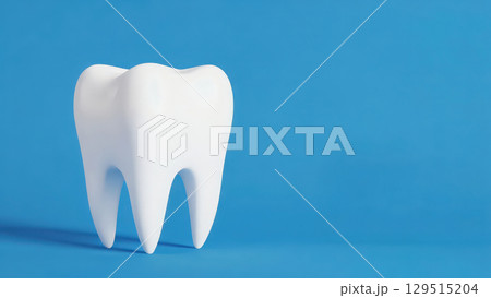 White tooth is shown on a blue background White tooth is shown on a blue background 129515204
