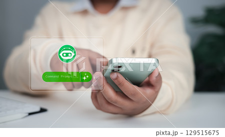 Artificial intelligence integration in daily life, customer service automation, and innovative business technology. Person using smartphone AI chatbot. 129515675
