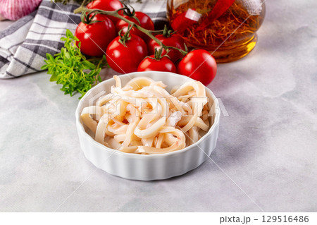 Canned marinated squid rings heap Canned marinated squid rings heap 129516486