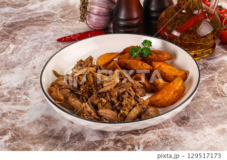 Baked shredded pork with potato Baked shredded pork with potato 129517173