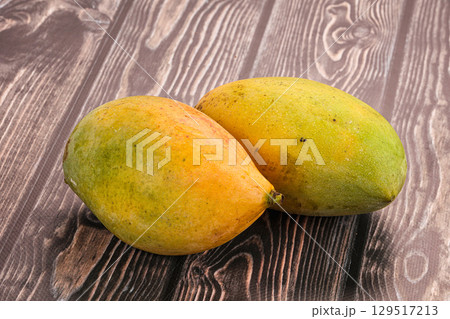 Sweet juicy ripe mango fruit 129517213