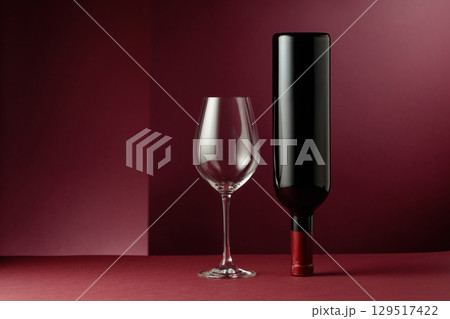 Red wine on a dark red background. Red wine on a dark red background. 129517422