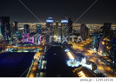 Night rooftop cityscape panorama of financial centre in Doha, Qatar Night rooftop cityscape panorama of financial centre in Doha, Qatar 129518516