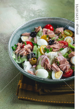 salad with canned tuna, vegetable salad with quail eggs, lettuce, red onion , cherry tomatoes , olives, keto food, healthy food, homemade, no people salad with canned tuna, vegetable salad with quail eggs, lettuce, red onion , cherry tomatoes , olives, keto food, healthy food, homemade, no people 129518701