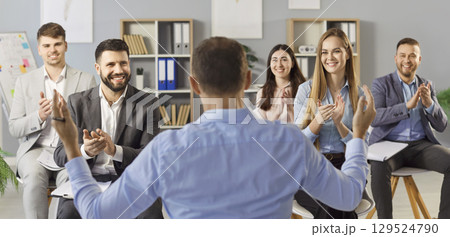 Providing professional IT and management training, man leading corporate meeting with colleagues 129524790