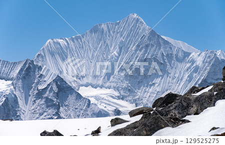 Beautiful view of Mt.Gangchempo (6,387 m) seen from Tsergo Ri (4,990m) the high point on the Langtang valley trek of Nepal. lies in Langtang region and has been perceived as best destination of Nepal. Beautiful view of Mt.Gangchempo (6,387 m) seen from Tsergo Ri (4,990m) the high point on the Langtang valley trek of Nepal. lies in Langtang region and has been perceived as best destination of Nepal. 129525275