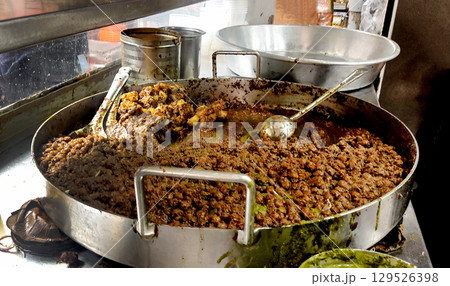 Chole bhature is a North Indian famous food dish. 129526398
