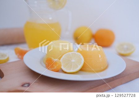 Homemade Citrus Pudding with Lemonade in Background Homemade Citrus Pudding with Lemonade in Background 129527728