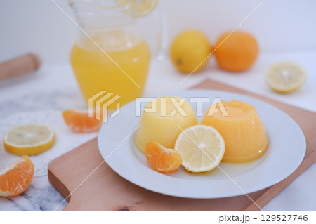 Homemade Citrus Pudding with Lemonade in Background Homemade Citrus Pudding with Lemonade in Background 129527746
