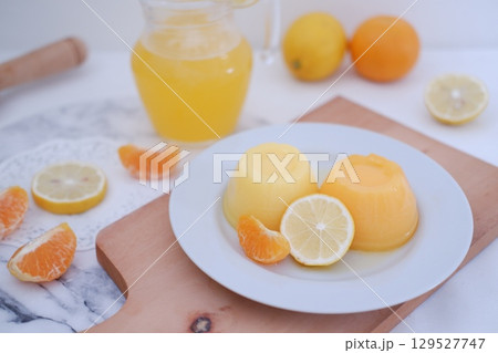 Homemade Citrus Pudding with Lemonade in Background Homemade Citrus Pudding with Lemonade in Background 129527747
