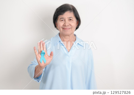 Elderly with blue Ribbon for concept of blue November, November Prostate Cancer Awareness month, World Diabetes day , Men Health month, International men, Father day. Healthcare and world cancer day Elderly with blue Ribbon for concept of blue November, November Prostate Cancer Awareness month, World Diabetes day , Men Health month, International men, Father day. Healthcare and world cancer day 129527826
