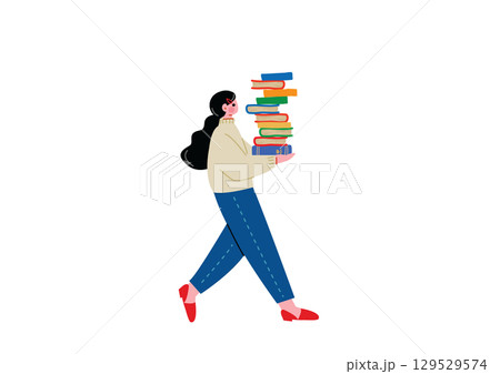 たくさんの本を抱えて歩く女性 129529574