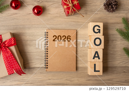 2026 New Year with notebook, Christmas gift and pen on wood table. Xmas, Happy New Year, Goals, Resolution, To do list, start, Strategy and Plan concept 2026 New Year with notebook, Christmas gift and pen on wood table. Xmas, Happy New Year, Goals, Resolution, To do list, start, Strategy and Plan concept 129529710