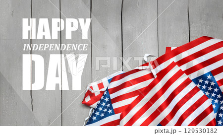 Joyful Independence Day celebration with American flags and festive decorations on wooden background Joyful Independence Day celebration with American flags and festive decorations on wooden background 129530182