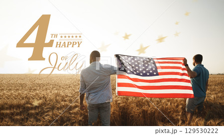 Celebrating independence with friends in a wheat field on the Fourth of July at sunset Celebrating independence with friends in a wheat field on the Fourth of July at sunset 129530222