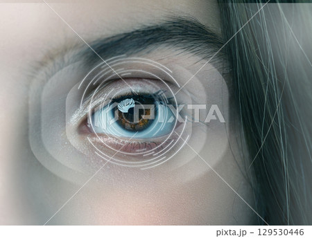 Close-up view of an eye showcasing vibrant colors and digital graphics representing technology in vision at a studio Close-up view of an eye showcasing vibrant colors and digital graphics representing technology in vision at a studio 129530446