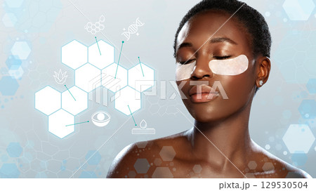 Skin care treatment session with under-eye patches and a focus on beauty technology in a modern setting 129530504