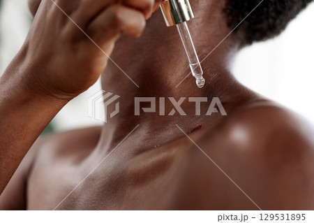 Skin care routine featuring serum application to enhance hydration and rejuvenation at home during daytime Skin care routine featuring serum application to enhance hydration and rejuvenation at home during daytime 129531895