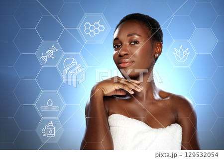 Woman in spa setting promoting natural skincare and wellness with scientific icons in background Woman in spa setting promoting natural skincare and wellness with scientific icons in background 129532054