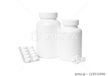 Two bottles next to a strip of pills, isolated on white, PNG 129532090