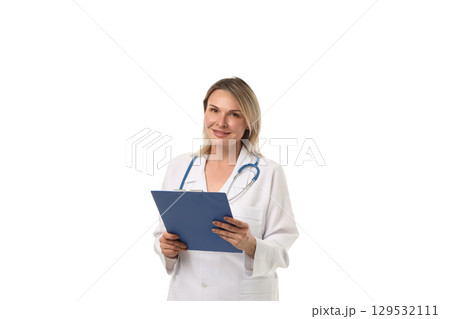 Doctor in white coat smiles with clipboard, isolated on white, PNG Doctor in white coat smiles with clipboard, isolated on white, PNG 129532111