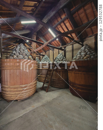 MISO barrel in MISO warehouse  / 日本の蔵造り～味噌蔵の内部と味噌樽 129532788