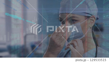 Image of data processing over caucasian female doctor with face mask Image of data processing over caucasian female doctor with face mask 129533515