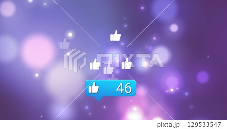 Digital image of multiple like icons with start of start hanging spots of lights on blue background 129533547