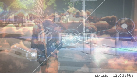 Image of data processing over african american businessman walking 129533665