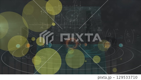 Image of dots blinking over solar system and data on digital screens over black background 129533710
