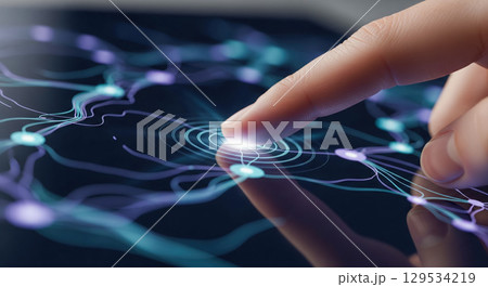 Finger activating neural network on liquid touch screen, person interacting with futuristic artificial intelligence system creating ripples on water surface 129534219