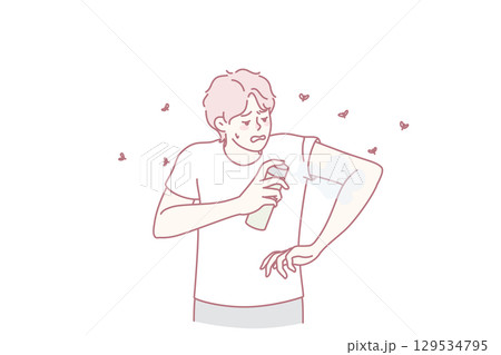 Young man apply anti-mosquito spray 129534795