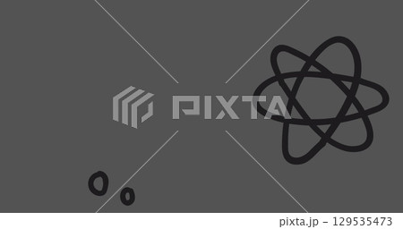 Image of falling molecules over dark background 129535473