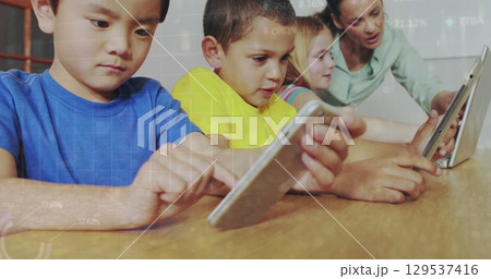 Image of data processing over diverse schoolchildren and teacher using tablet 129537416
