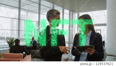 Image of particles over male scientist with robot 129537621