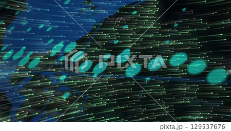 Image of graphs and green lights moving on black background 129537676