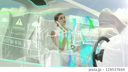 Image of data processing over caucasian businesswoman in modern car 129537684