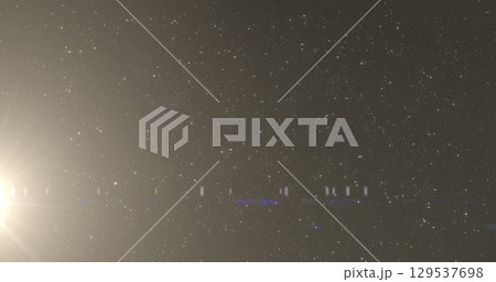 Image of light spots over black background 129537698