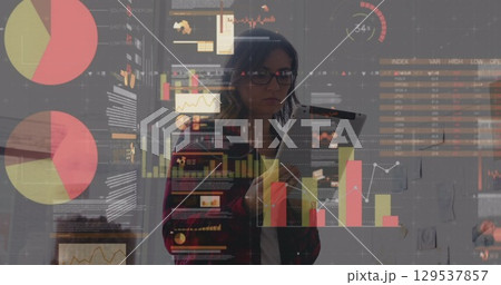 Image of data processing over caucasian businesswoman at office Image of data processing over caucasian businesswoman at office 129537857