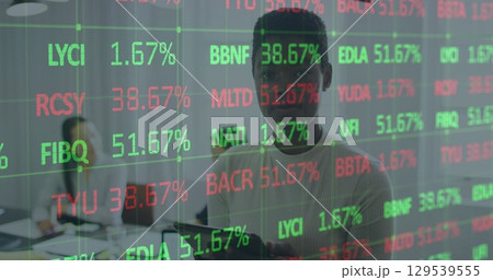 Image of data processing over diverse business people talking in office Image of data processing over diverse business people talking in office 129539555