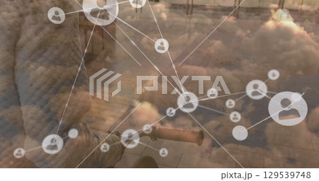 Image of network of connections over clouds and african american businesswoman 129539748