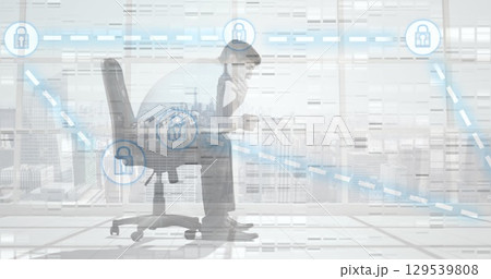 Image of connections with padlocks over tired caucasian businessman in office Image of connections with padlocks over tired caucasian businessman in office 129539808