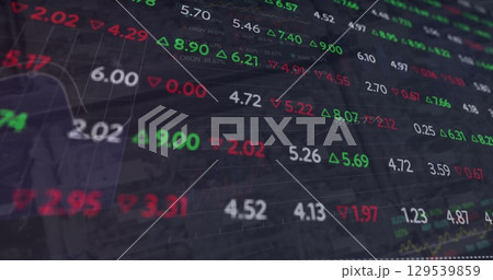 Image of financial data processing over graph and charts on black background 129539859