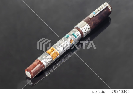 Branded fountain pen on marble gray background. Gift set. Office interior. Branded fountain pen on marble gray background. Gift set. Office interior. 129540300