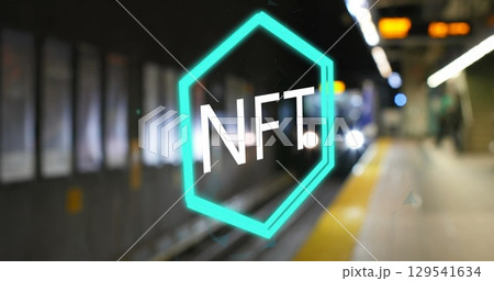 Image of nft logo over underground train arriving at metro station 129541634