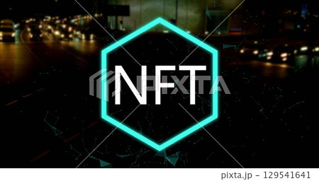 Image of nft logo over fast speed traffic on city street at night 129541641